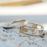 Ombre Blue Ring with Sapphires and Diamonds. Roman Numeral Ring in Yellow Gold with Diamond.